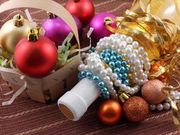 Bottle champagne wine with christmas balls — Stock Photo, Image