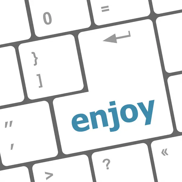 Enjoy word on keyboard key, notebook computer button — Stock Photo, Image