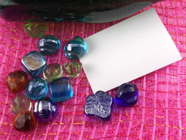 Champagne bottle with stones — Stock Photo, Image