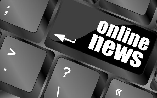 Online news button on computer keyboard key
