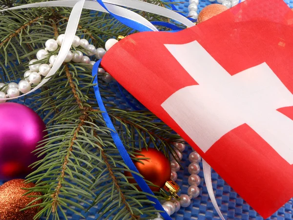 Bandera de Suiza con decoración de Navidad, tarjeta de año nuevo —  Fotos de Stock