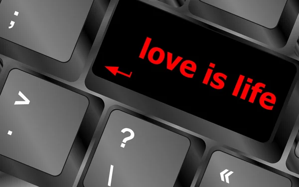 Modern keyboard with love is life text symbols — Stock Photo, Image