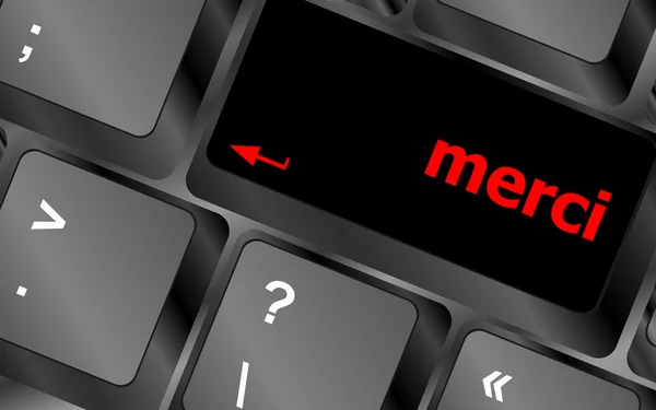 コンピューターのキーボードのキー上の merci の単語 — ストック写真