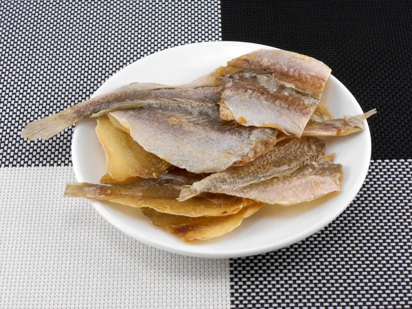 Delicious fish on white plate — Stock Photo, Image
