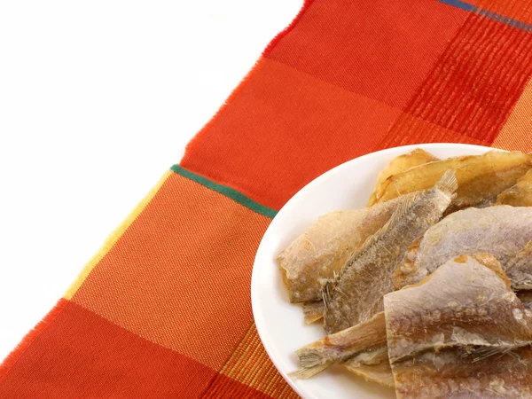 Peces secos en un plato — Foto de Stock
