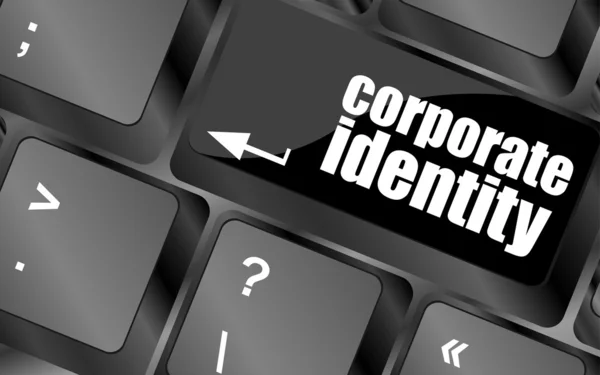 Botão de identidade corporativa na tecla do teclado do computador — Fotografia de Stock