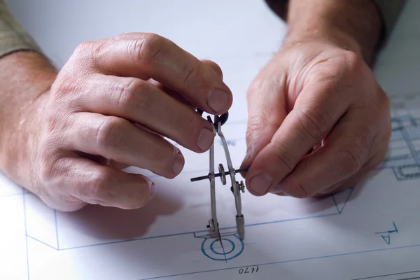 Male hands in the drawings — Stock Photo, Image