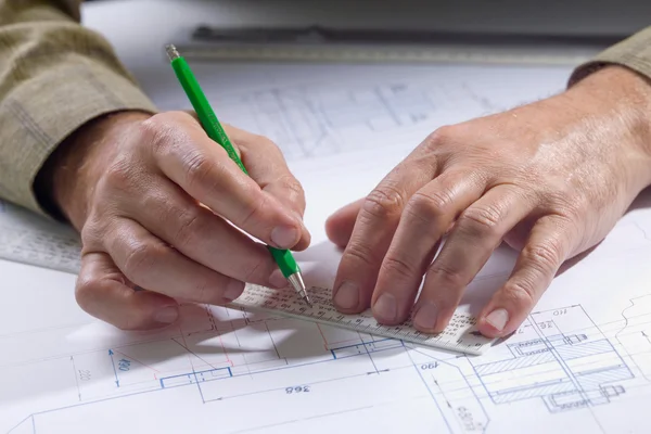 Male hands in the drawings — Stock Photo, Image