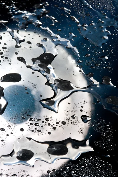 Krople wody na lustro — Zdjęcie stockowe