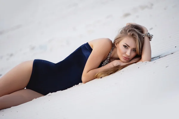 Charming girl on the beach in clothes — Stock Photo, Image