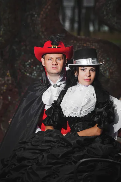 Man and woman in costume — Stock Photo, Image