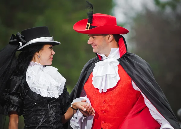 Man and woman in costume — Stock Photo, Image