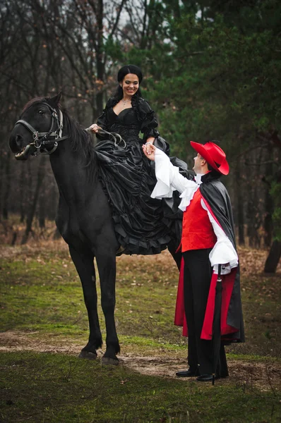 Man and woman in costume — Stock Photo, Image