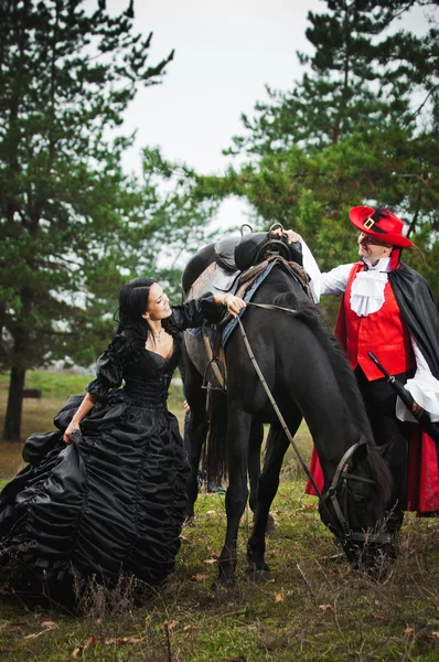 Man and woman in costume — Stock Photo, Image