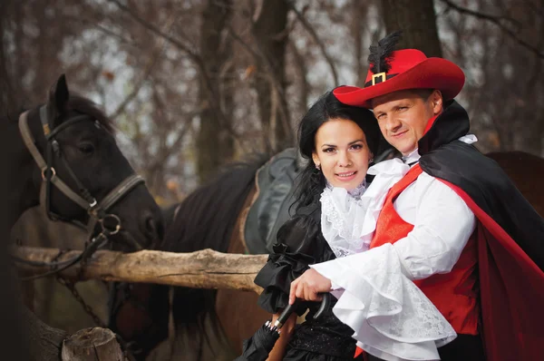 Man and woman in costume — Stock Photo, Image