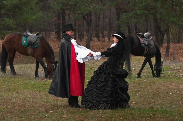 Uomo e donna in costume — Foto Stock