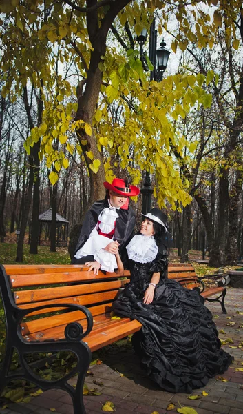 Man and woman in costume — Stock Photo, Image