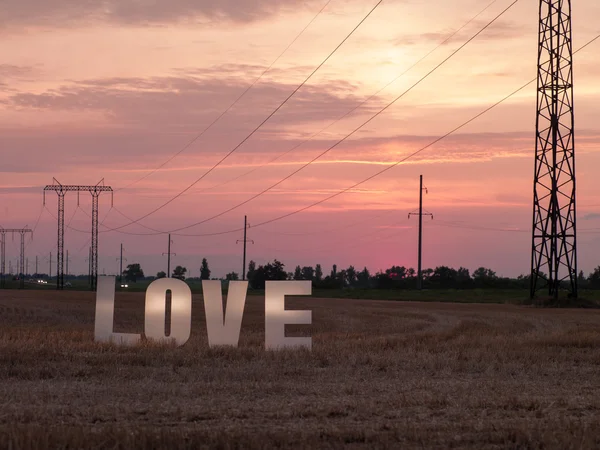 Photo love letters on sunset background — Stock Photo, Image