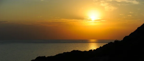 Захід сонця у морі — стокове фото