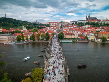 Architecture of Prague on the background of the river from above.