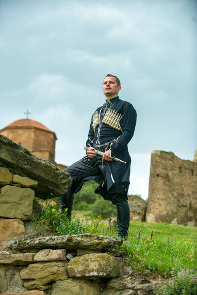 A man in the national clothes of Georgia on