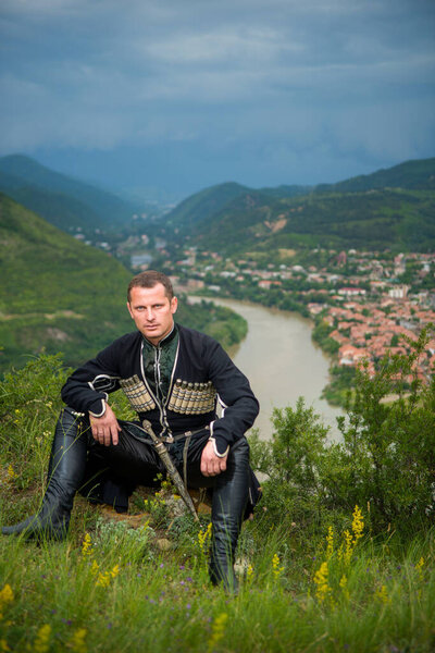 A man in the national clothes of Georgia on
