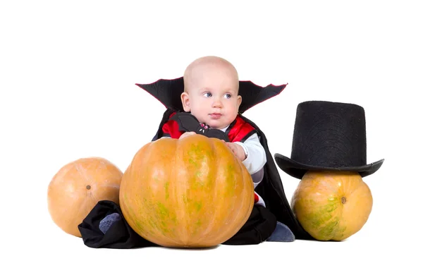 Baby boy in black halloween cloak with hat — Stock Photo, Image