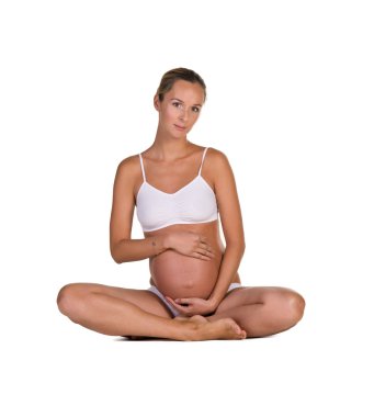 yoga poz içinde hamile kadın