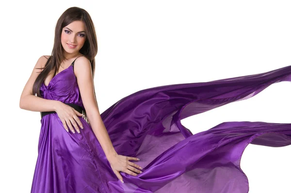 Menina em vestido roxo voador — Fotografia de Stock