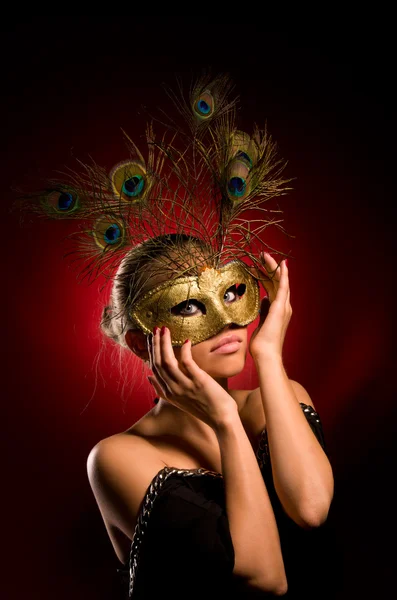 Girl with carnival mask in hand — Stock Photo, Image
