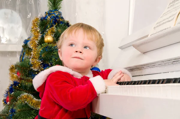 Menino vestido de Papai Noel — Fotografia de Stock