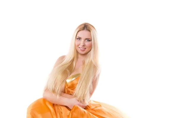 Fille blonde en robe de vol orange — Photo