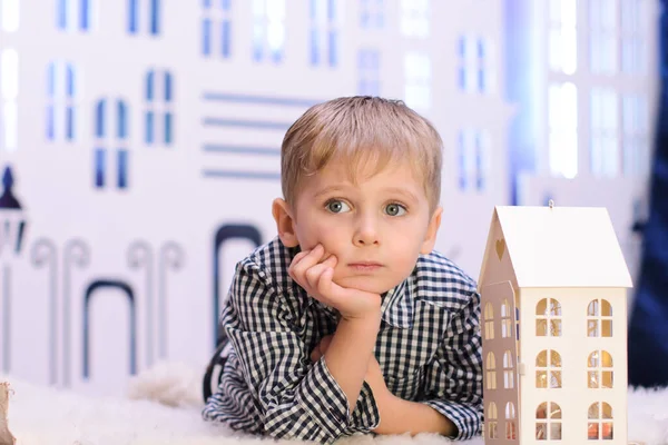 Blond Little Boy Lies Floor Propping His Face His Hands — Stock Photo, Image