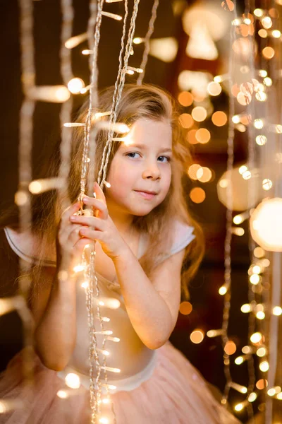 Portrait Cute Girl Tutu Skirt Curtains Hanging Luminous New Year — Stock Photo, Image