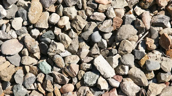 Superfície de pedras e cascalho para fundos e texturas — Fotografia de Stock
