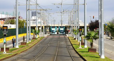 Streetcars in the Avenue of the Meridiana clipart