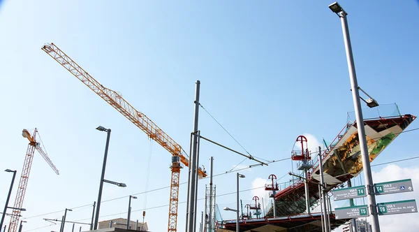 Cranes and metallic structure — Stock Photo, Image