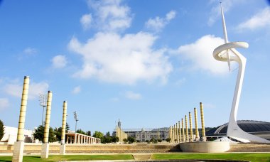 Panoramic of Montjuïc's ring of Barcelona with antenna of Telefonica and columns of light