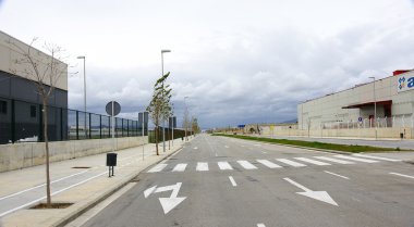 Empty road in an industrial estate clipart