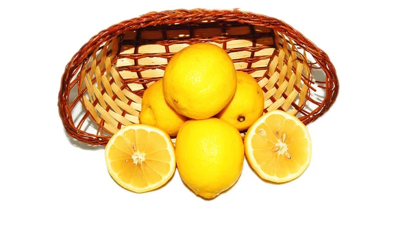 Basket of lemons on white background — Stock Photo, Image