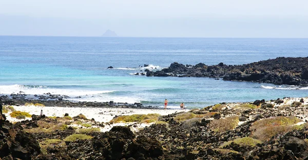 Punta Mujeres beach and motorcycle on the road, — Stock Photo, Image