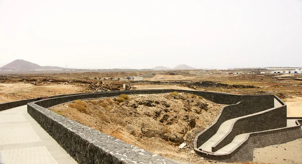 Ride stone walls in the port of Los Marbles Arrecife — Stock Photo, Image