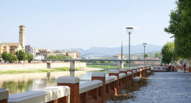 Ebro river passing by Tortosa clipart