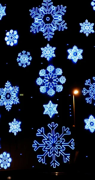 Facade of building in Barcelona lit for Christmas — Stock Photo, Image