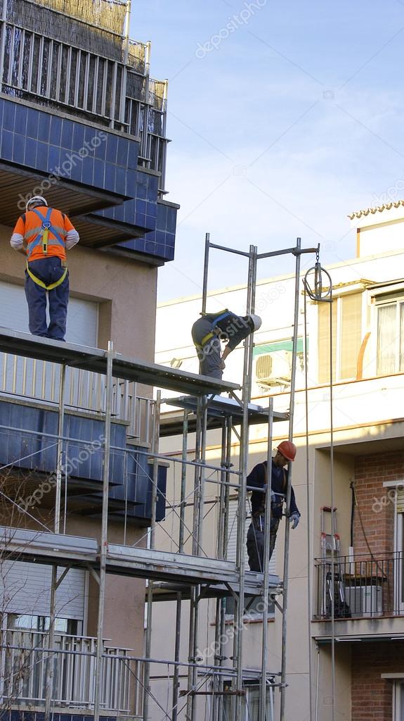 Men working on a scaffold