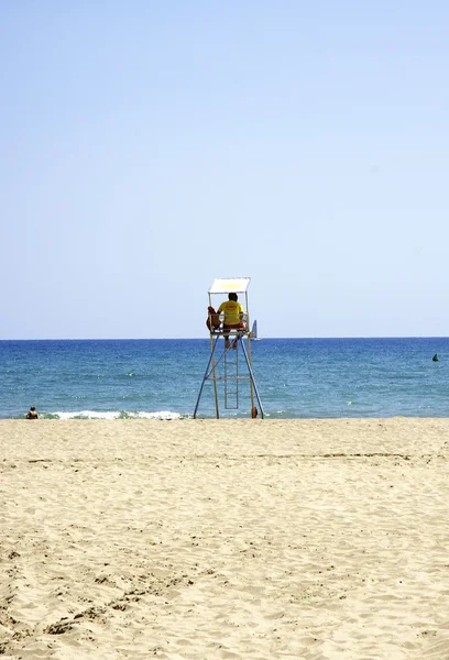 Lifeguard in his post beach — Stock Photo, Image