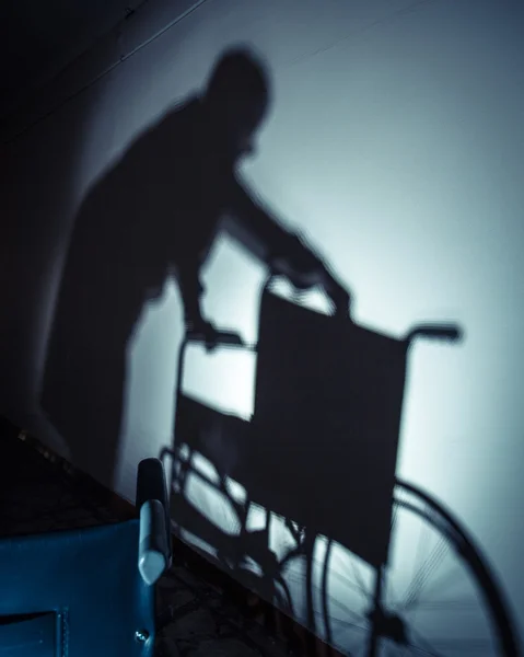 Хворі люди та інвалідне крісло Стокове Зображення