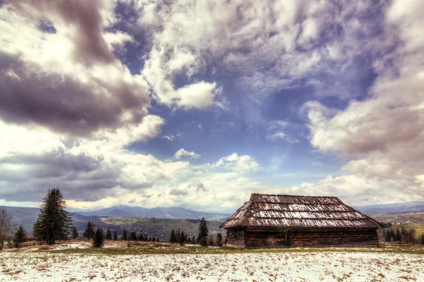 Ukrainian village in winter Carpathians. Panorama. — Stock Photo, Image