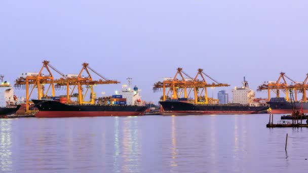 Time-lapse, Big crane bridge shipping container cargo in shipyard at twilight. — Stock Video