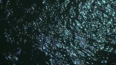 overflow of water surface on river. slow motion